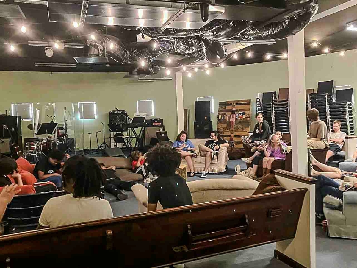 The Attic youth space with students and leaders